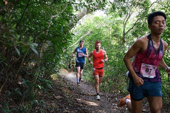 High Humidity Poses Challenge: KC Chan and Hannah Bainbridge Claim 14km Men's and Women's Titles